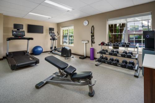 a gym with weights and equipment in a room at Residence Inn Seattle Northeast/Bothell in Bothell