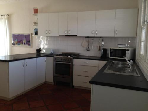 A kitchen or kitchenette at Parmelia House