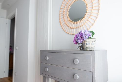 a mirror on top of a dresser in a room at Il Pino - Montefiascone in Montefiascone