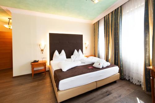 Postel nebo postele na pokoji v ubytování Hotel Engel