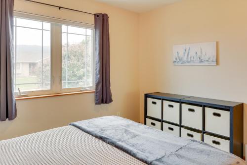 a bedroom with a bed and a window at Roomy Piedmont Home with Yard Less Than 14 Mi to Sturgis! in Piedmont