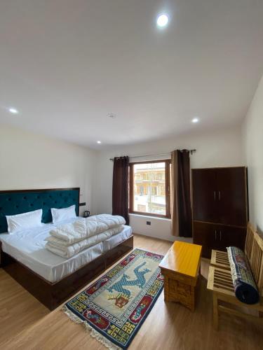 Postel nebo postele na pokoji v ubytování Dolker Homestay