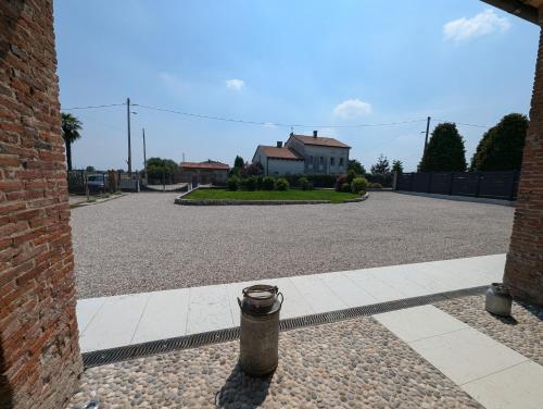 a fire hydrant sitting in the middle of a driveway at B&B Cà Breganze in Breganze