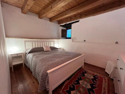 Una cama o camas en una habitación de Borgo Fontanini