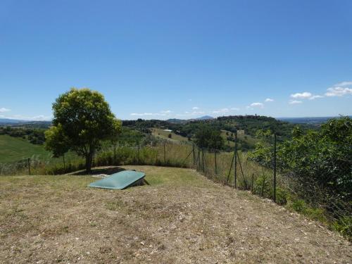 a green object sitting on top of a hill at Scappo in Umbria, Collefiorito in Rocchette