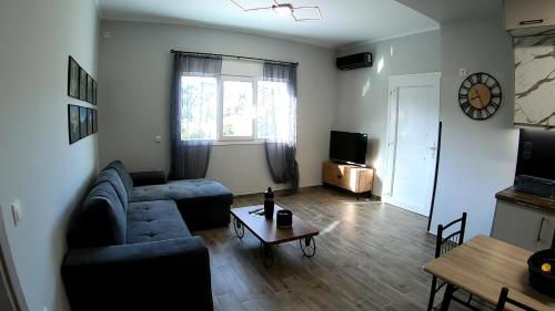 Posezení v ubytování Arianas apartment