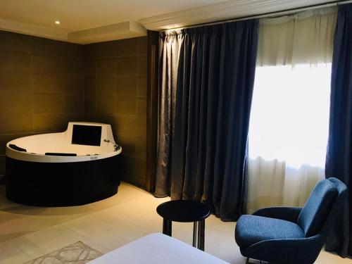 Summerset Continental Hotel Maitama by T E L E Hospitalityにあるベッド