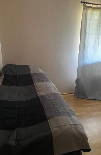 Postel nebo postele na pokoji v ubytování Kimito Village