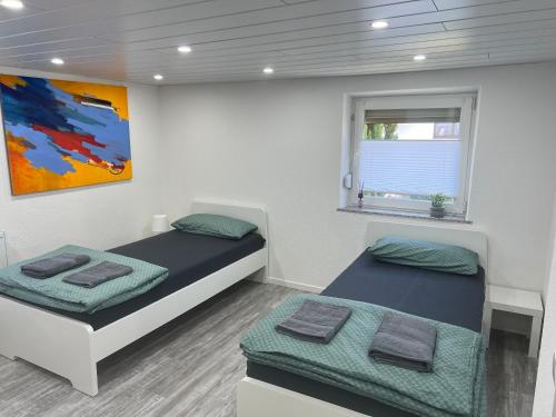 Ένα ή περισσότερα κρεβάτια σε δωμάτιο στο Merys Home