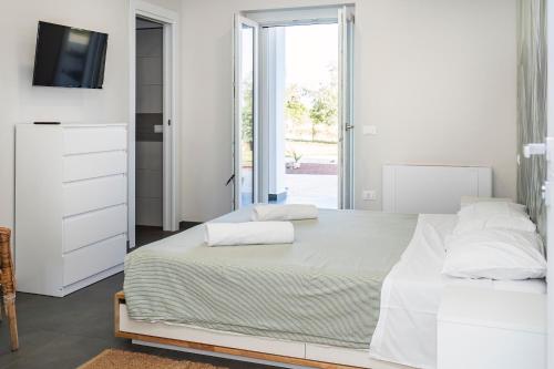 Letto o letti in una camera di Marilù dream house a 800 mt dal mare di Formia