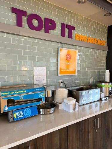 a counter with a top it sign in a kitchen at Tru By Hilton Lancaster East in Lancaster