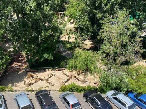 an overhead view of a parking lot with parked cars at КАСКАДАС Луксозни нови студия in Sunny Beach