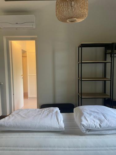 Postel nebo postele na pokoji v ubytování Casa di Giulia