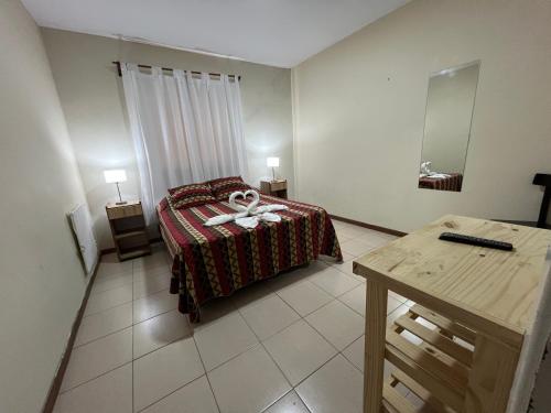Ένα ή περισσότερα κρεβάτια σε δωμάτιο στο Hotel Gran Continente