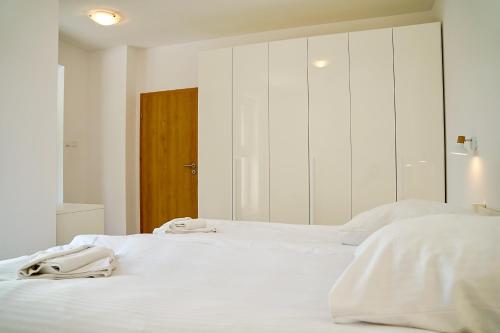 Posteľ alebo postele v izbe v ubytovaní Prima by Baltic Home