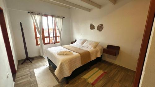 En eller flere senge i et værelse på Lindo Apartamento ubicado a 3 cuadras de Plaza Mayor