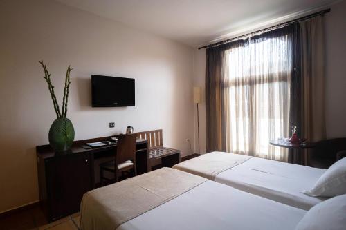 Postel nebo postele na pokoji v ubytování Hotel Albaida Nature