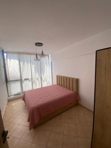 Кровать или кровати в номере Duplex Durres