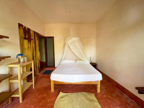 Ein Bett oder Betten in einem Zimmer der Unterkunft Posada La Sabila