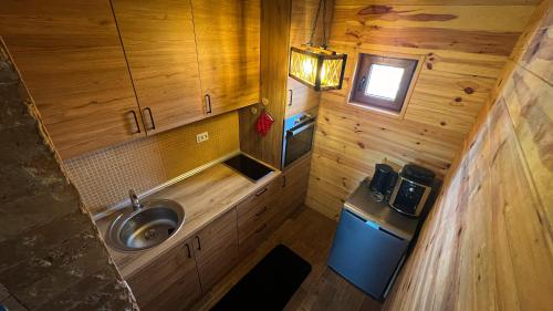 an overhead view of a bathroom with a sink at Sweet Home Zabljak in Žabljak