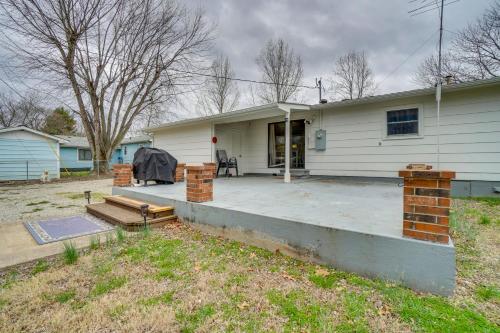 a house with a patio in front of it at Shell Knob Home with Fire Pit, Near Table Rock Lake! in Shell Knob