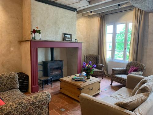 Ruang duduk di Maison de vacances l épicerie