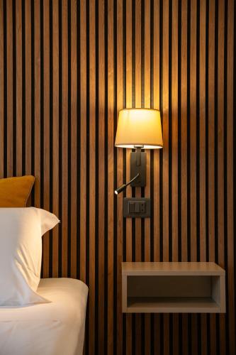 Postel nebo postele na pokoji v ubytování Gelsi Luxury Suites