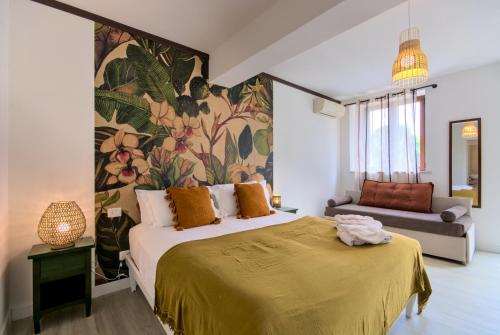 A bed or beds in a room at Villa Morro Suites