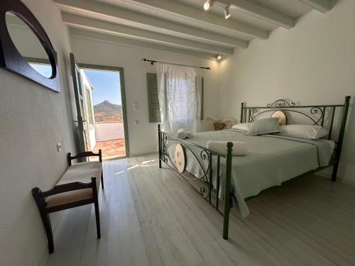 Ένα ή περισσότερα κρεβάτια σε δωμάτιο στο Siroco Deluxe House