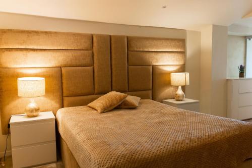 En eller flere senge i et værelse på Cidadela do Viriato Deluxe