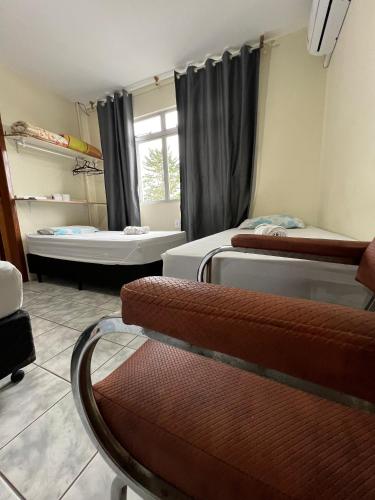 Katil atau katil-katil dalam bilik di Hotel Rodeio