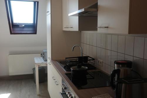 Dapur atau dapur kecil di Moderne Wohnung in Eutritzsch