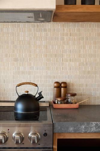 a tea kettle on a stove in a kitchen at Sand Castle in Imperial Beach