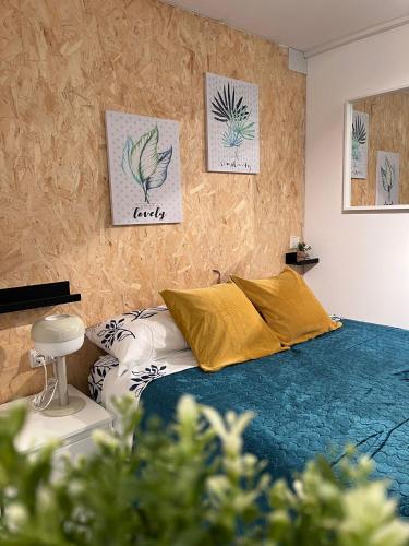 Ένα ή περισσότερα κρεβάτια σε δωμάτιο στο LOFT Céntrico MALIAÑO - DUA ROOMS