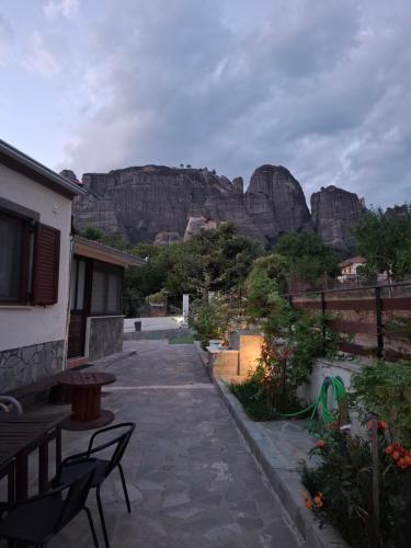 a patio with a view of a mountain at Paradise of Meteora A in Kastrákion