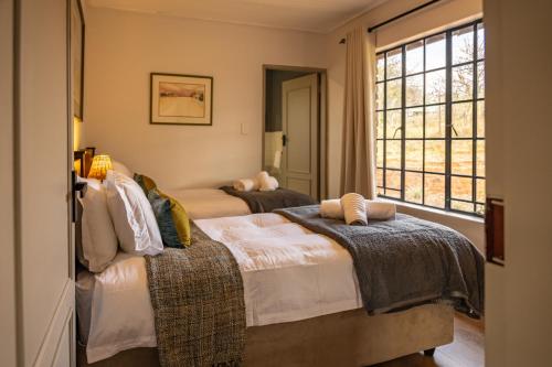 Cama o camas de una habitación en The Little Haven - Clarens