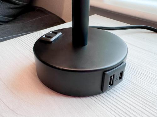 a black router sitting on top of a table at morii - townhome with pool in Pensacola