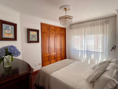 Кровать или кровати в номере Lar da Amarella