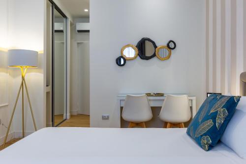 Postel nebo postele na pokoji v ubytování Casa Lounge Costituzione