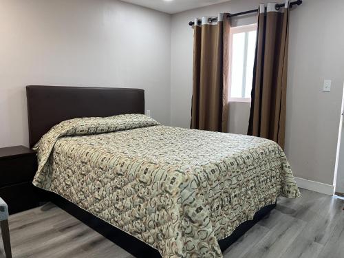 Ένα ή περισσότερα κρεβάτια σε δωμάτιο στο Kluane Park Inn