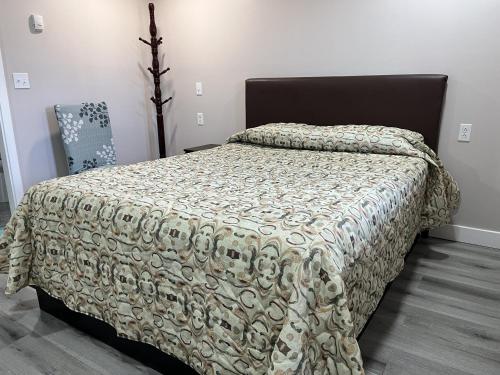Ένα ή περισσότερα κρεβάτια σε δωμάτιο στο Kluane Park Inn