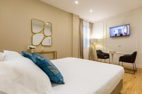 Postel nebo postele na pokoji v ubytování Casa Lounge Costituzione