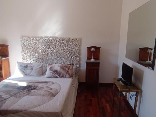Кровать или кровати в номере B&B Villetta Poggio
