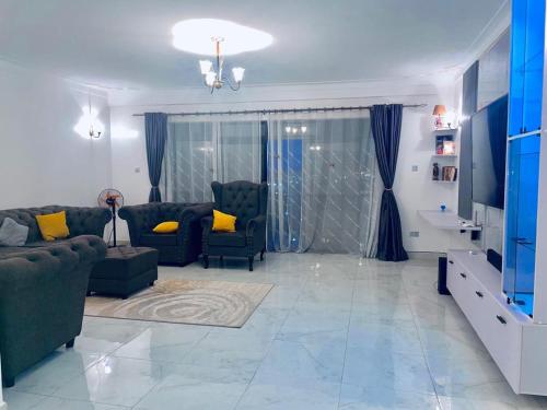 Posezení v ubytování SAFARI LAKE VIEW SUITES, KITENDE