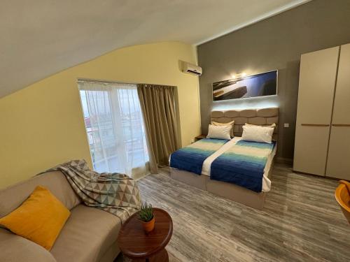 Postel nebo postele na pokoji v ubytování Family hotel Neptun - Lozenets
