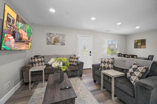 a living room with a couch and a table at Modern Oasis New 2BR in La Mesa in La Mesa