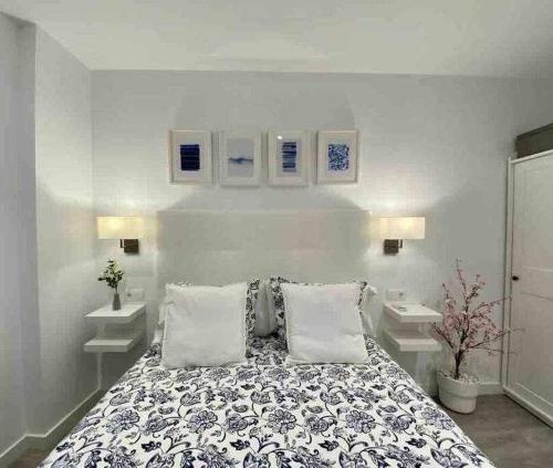 Katil atau katil-katil dalam bilik di XII Apartamentos Morales & Arnal