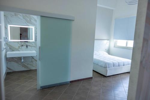 Cama o camas de una habitación en V&G palma di montechiaro