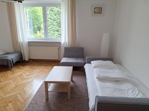 Katil atau katil-katil dalam bilik di Apartament Park Redena