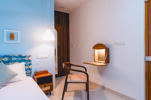 Una cama o camas en una habitación de Nivara stays